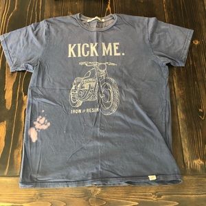 Kick me iron and resin